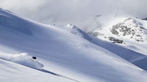 snowmobile backcountry skiing